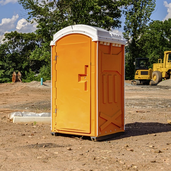 what is the cost difference between standard and deluxe portable restroom rentals in Jamestown